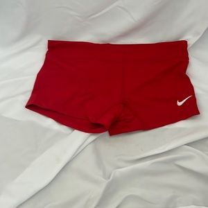 red nike shorts
